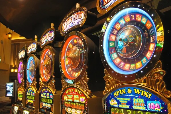 panenslot77 platform showing Caishen Wins, Liga 1 markets, and MotoGP betting in one interface